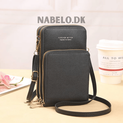 Icone™ PetiteBag - Mini Skinn Crossbody Budbringerveske